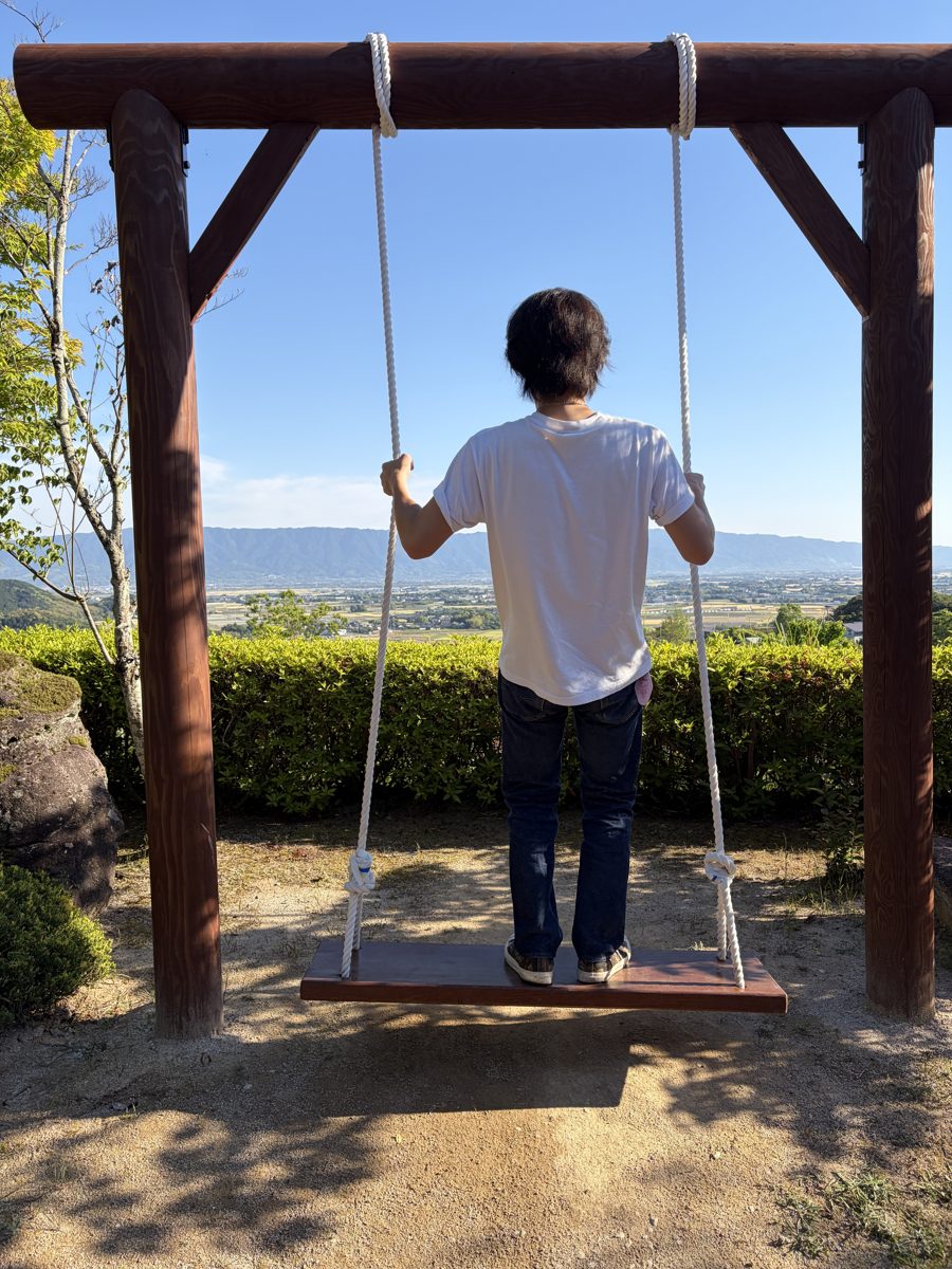 久留米の景色を眺める村門 央